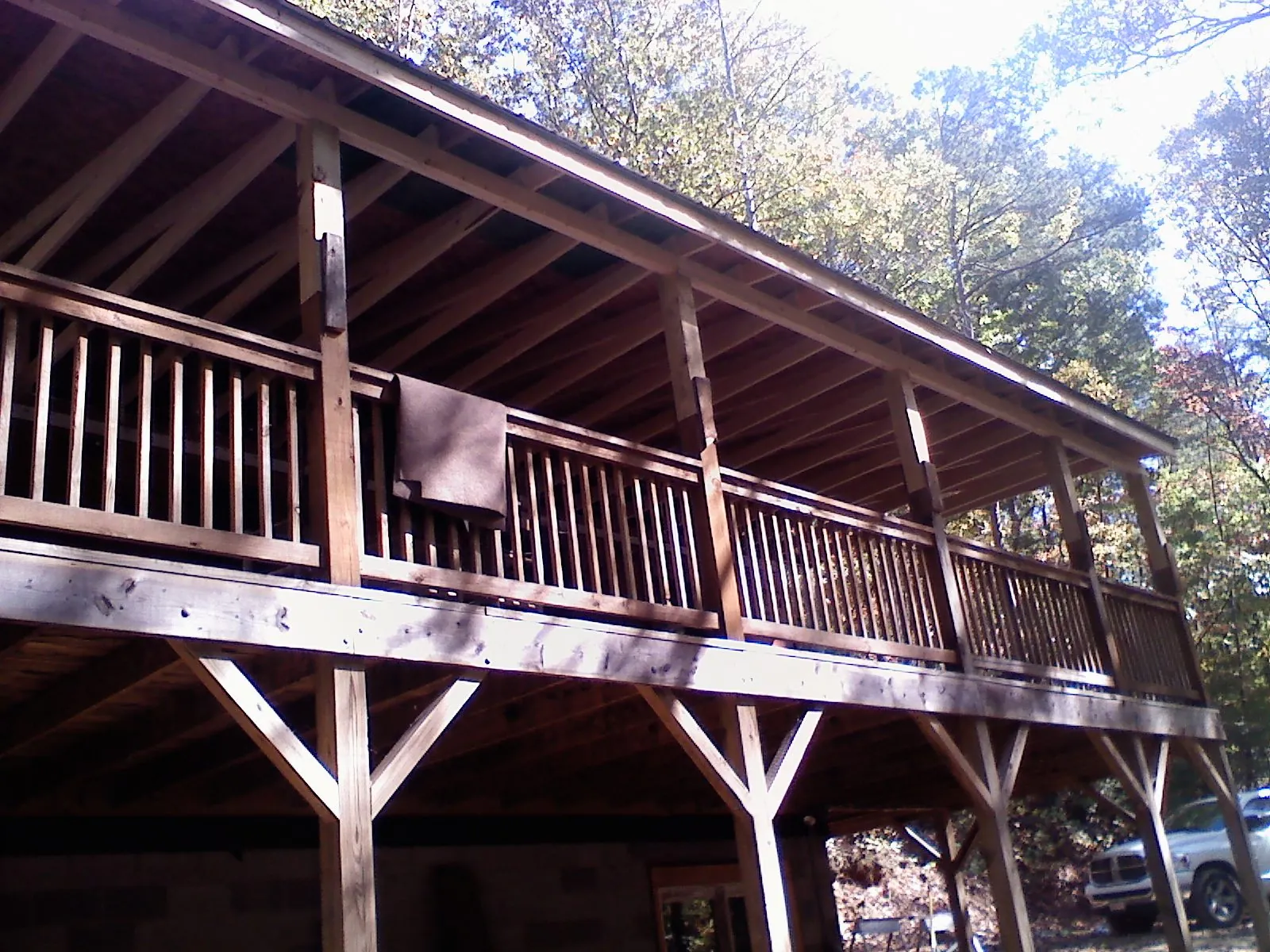 Timber framing under a new elevated porch and deck — Roof Leak Repair in Havensville by Roofing Brothers